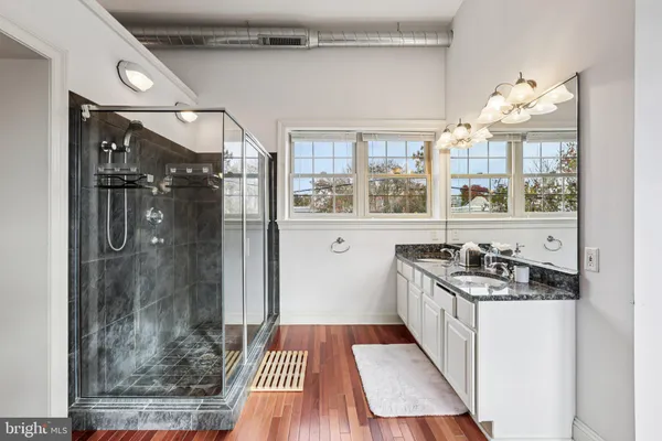 a white bath tub sitting in a bathroom