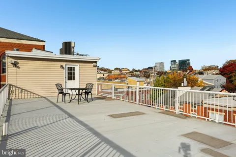 a view of a terrace with chairs