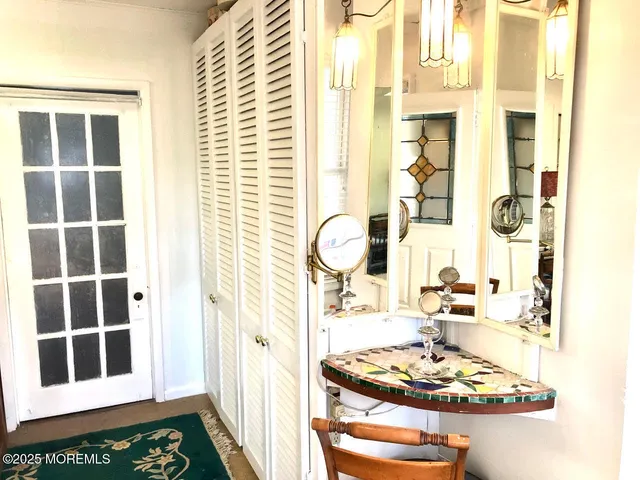 a view of a chairs and table in a patio