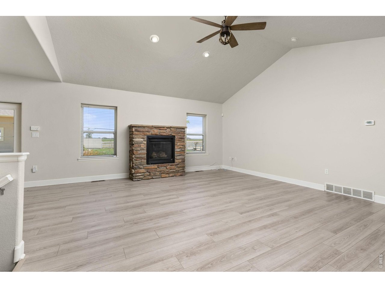 2002 Trail Ridge Drive Severance, CO 80615 - Photo 12 of 50 Inside, the ranch-style layout offers an open, vaulted living area with a gas fireplace, fully updated kitchen, and a main-level primary suite.