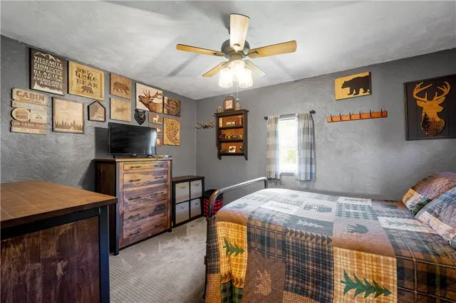 a bedroom with a bed and furniture