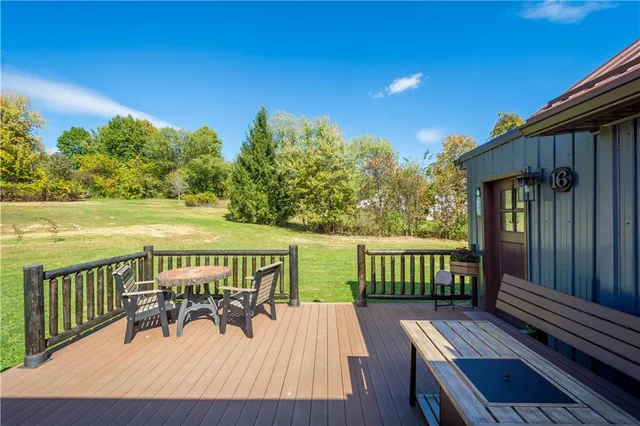 a view of a patio with wooden floor