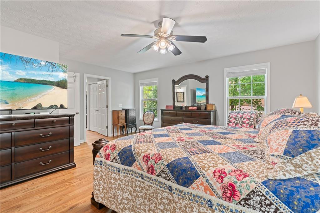 86 Back Trail Cleveland, GA 30528 - Photo 20 of 53 a bedroom with a bed and a dresser