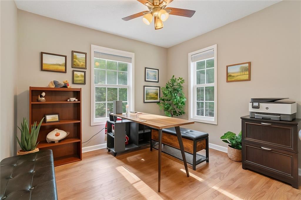 86 Back Trail Cleveland, GA 30528 - Photo 24 of 53 a living room with furniture and a window