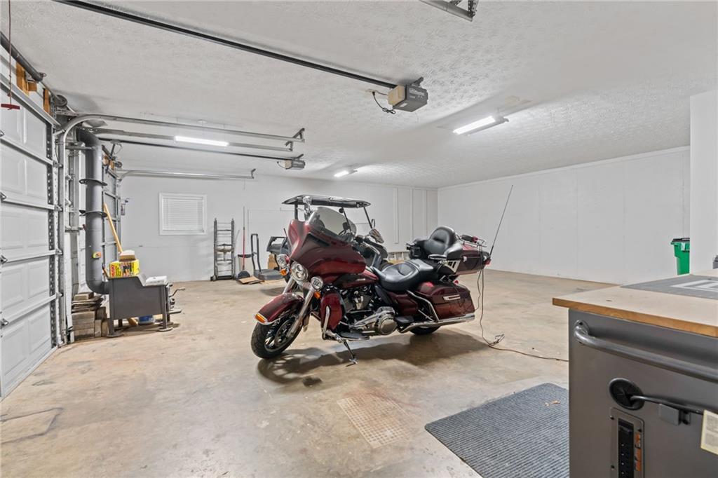 86 Back Trail Cleveland, GA 30528 - Photo 32 of 53 a view of a room with gym equipment
