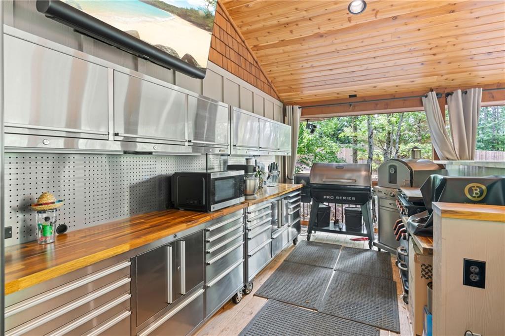 86 Back Trail Cleveland, GA 30528 - Photo 35 of 53 a backyard of a house with yard and outdoor seating