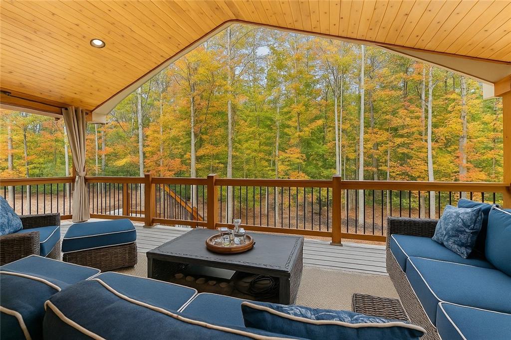 86 Back Trail Cleveland, GA 30528 - Photo 4 of 53 a living room with furniture and a floor to ceiling window