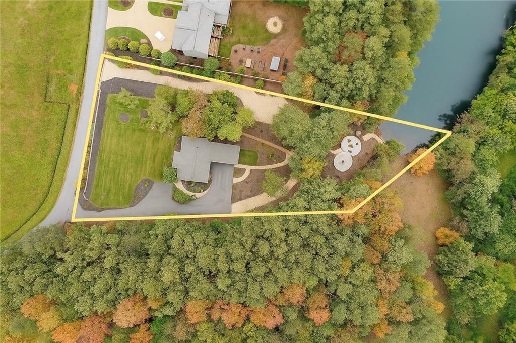 86 Back Trail Cleveland, GA 30528 - Photo 43 of 53 a bathroom with a sink and mirror