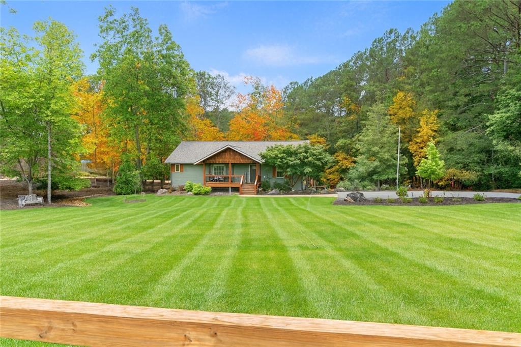 86 Back Trail Cleveland, GA 30528 - Photo 45 of 53 a view of an house with a yard