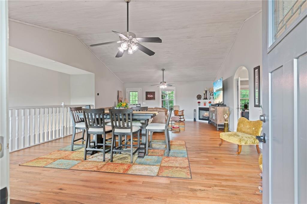 86 Back Trail Cleveland, GA 30528 - Photo 8 of 53 a view of a dining room with furniture and wooden floor