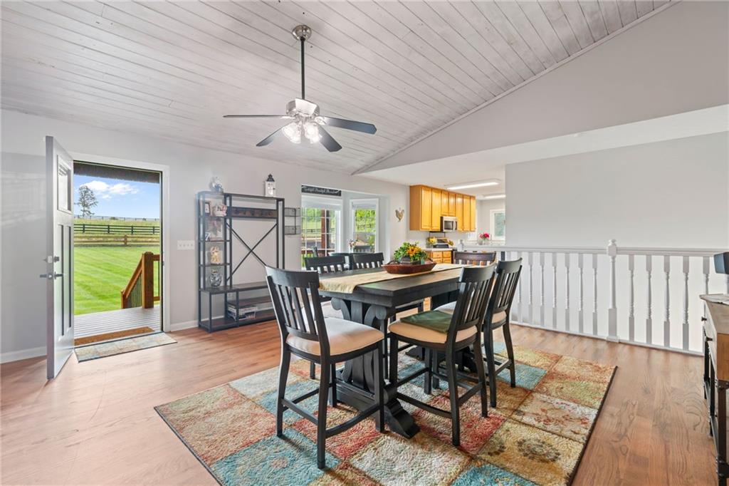 86 Back Trail Cleveland, GA 30528 - Photo 9 of 53 a view of a dining room with furniture and a rug