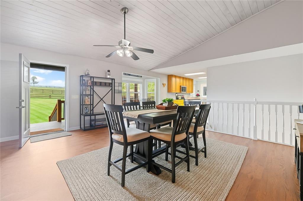86 Back Trail Cleveland, GA 30528 - Photo 10 of 53 a view of a dining room with furniture window and wooden floor