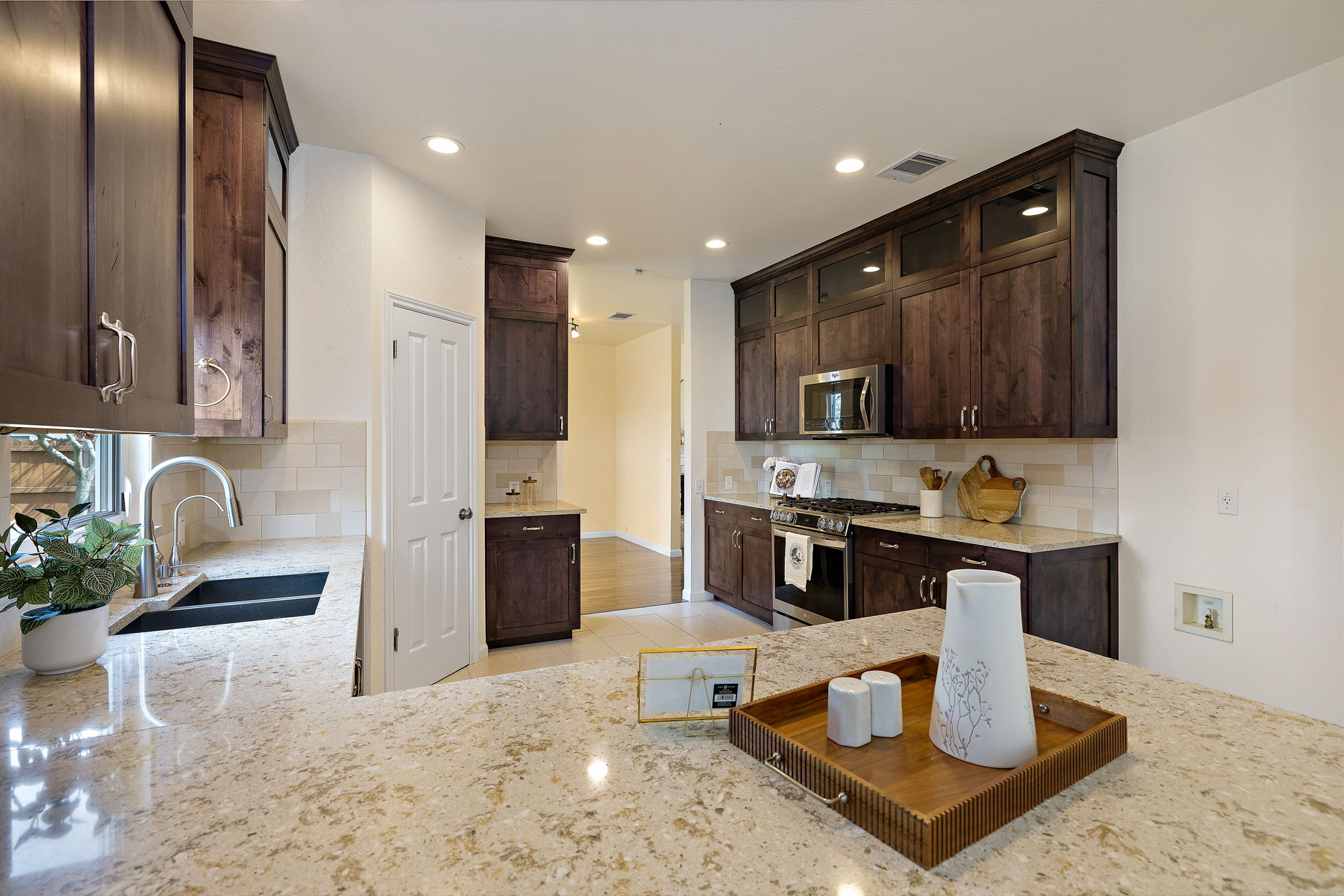 2201 Kerr Trail Cedar Park, TX 78613 - Photo 12 of 32 Updated appliances including gas range, dishwasher, and microwave make cooking a breeze