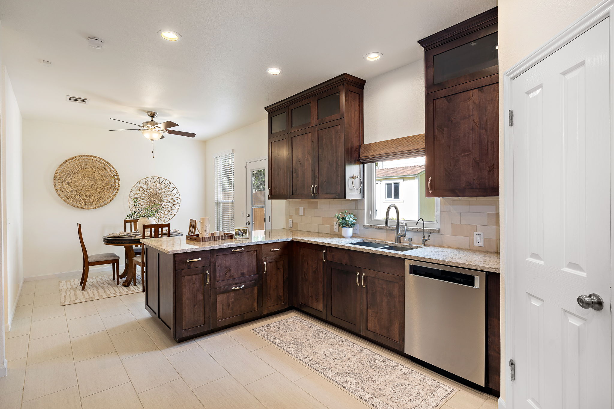 2201 Kerr Trail Cedar Park, TX 78613 - Photo 13 of 32 Kitchen is complete with a double sink under a transom picture window and a breakfast nook