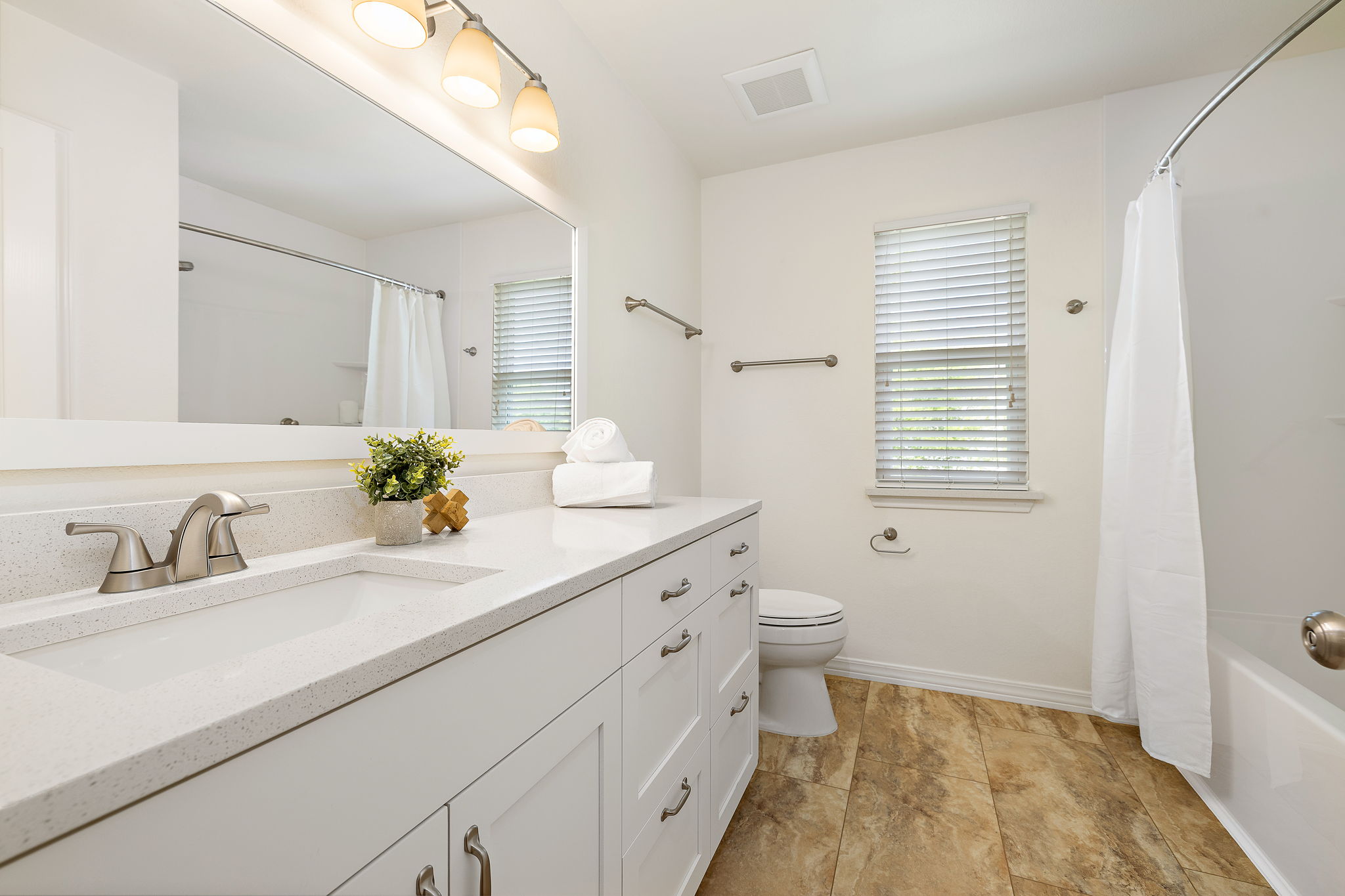 2201 Kerr Trail Cedar Park, TX 78613 - Photo 23 of 32 Spacious secondary upstairs bathroom with an updated shower/tub and plenty of storage