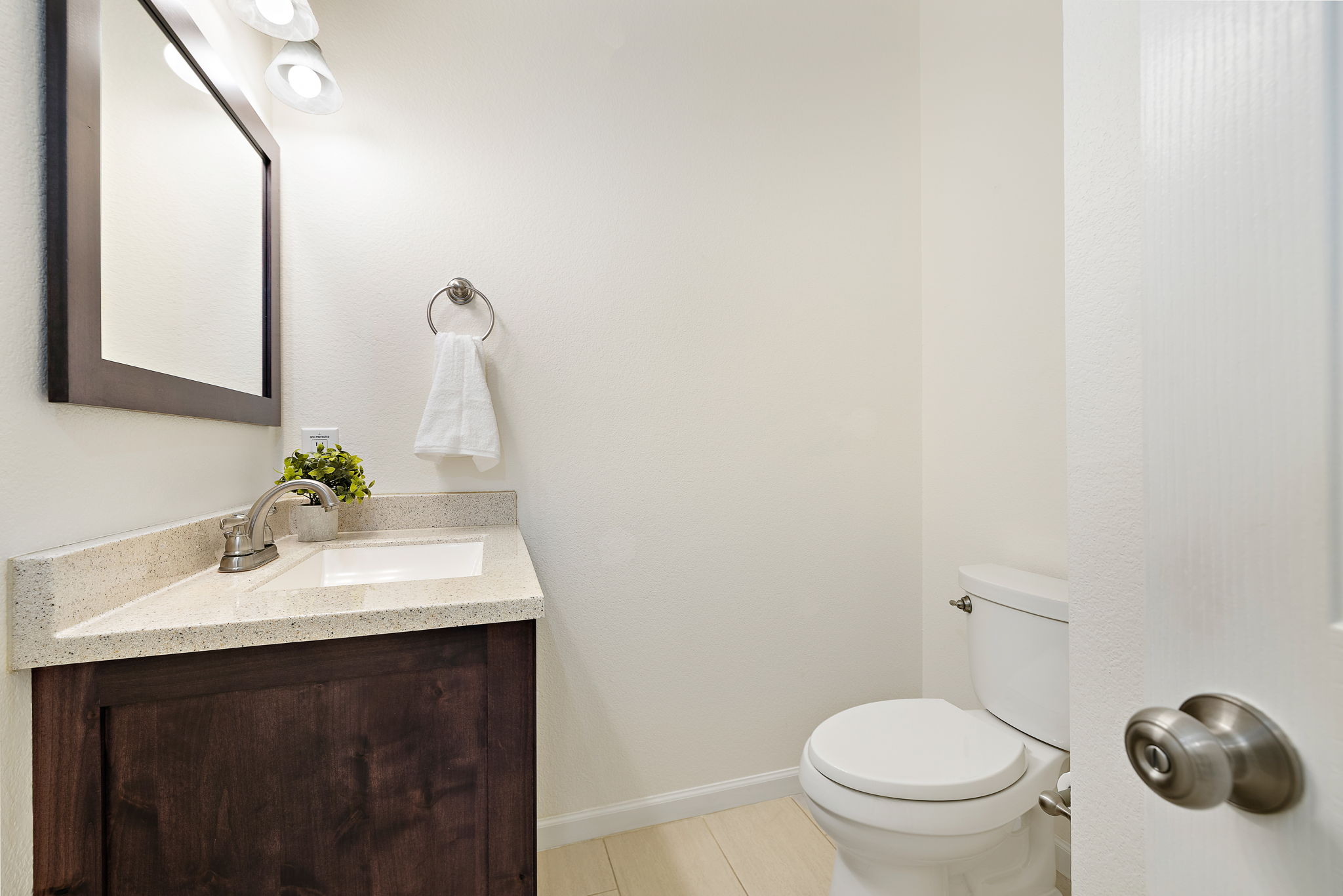 2201 Kerr Trail Cedar Park, TX 78613 - Photo 25 of 32 Half bath located on the main floor with custom cabinetry and countertops to match the kitchen
