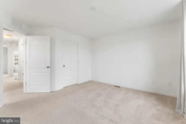 a bathroom with a double vanity sink toilet and shower