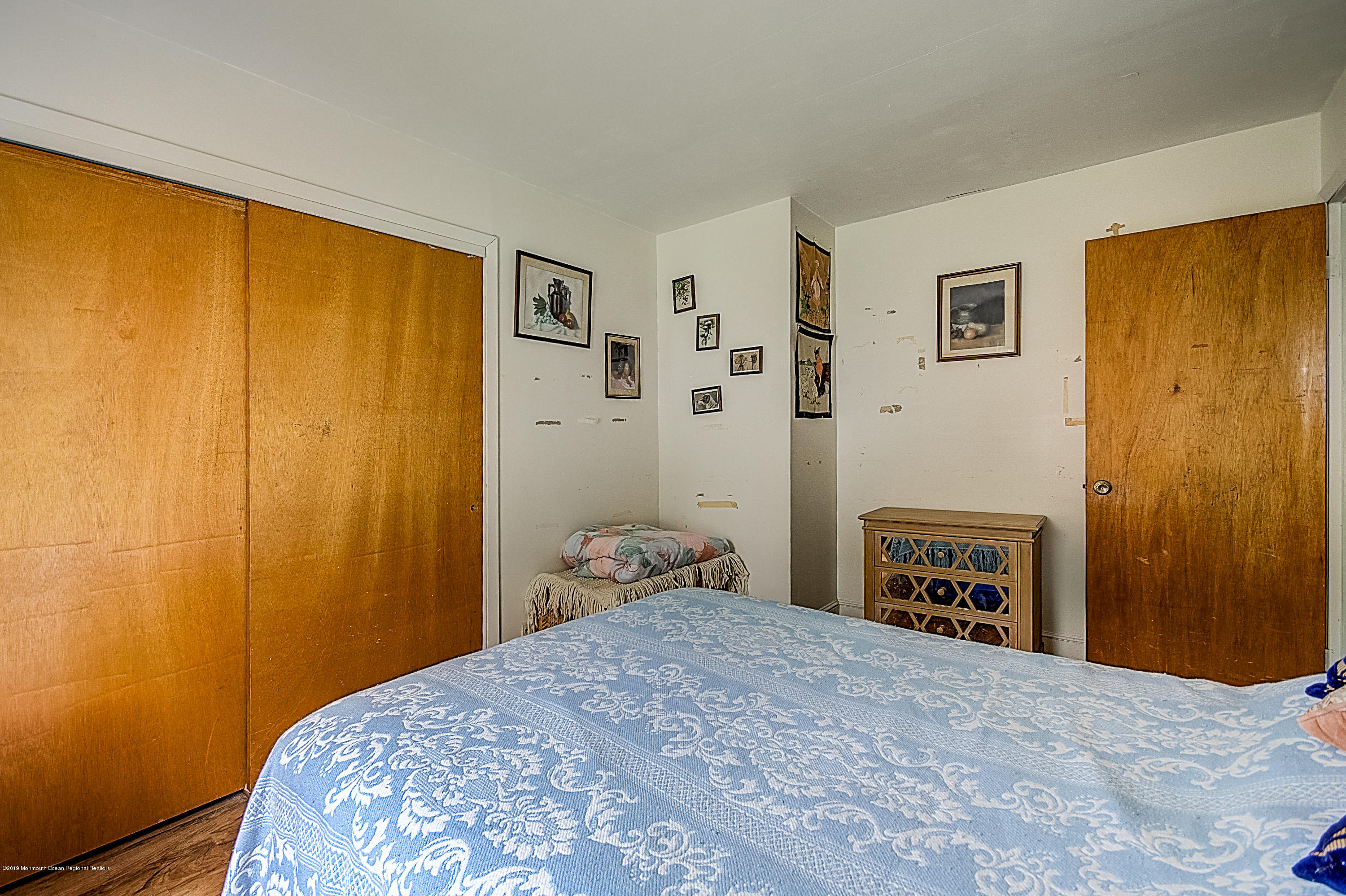 137 Pond Road Freehold, NJ 07728 - Photo 22 of 52 a bedroom with a bed and a window