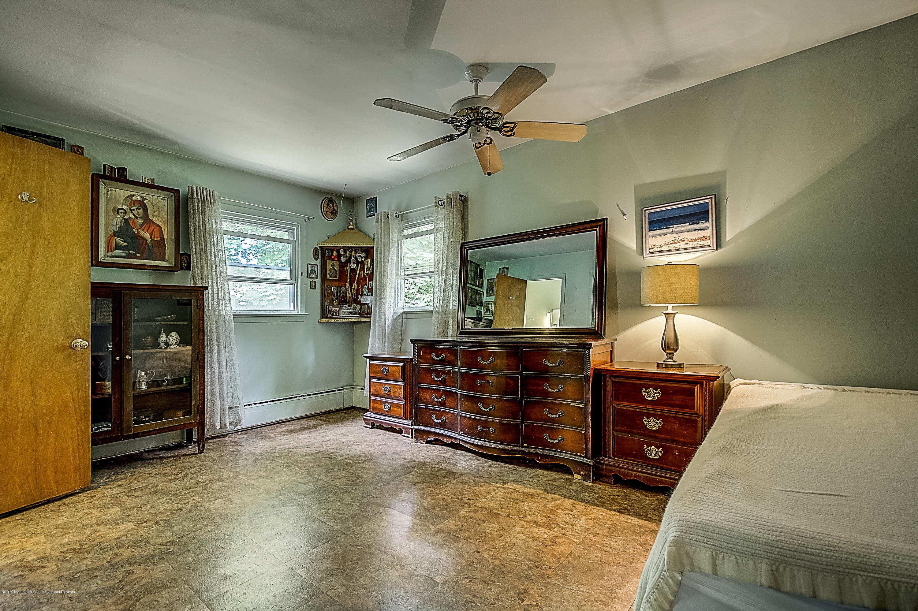 137 Pond Road Freehold, NJ 07728 - Photo 34 of 52 a bed room with a bed and a tv