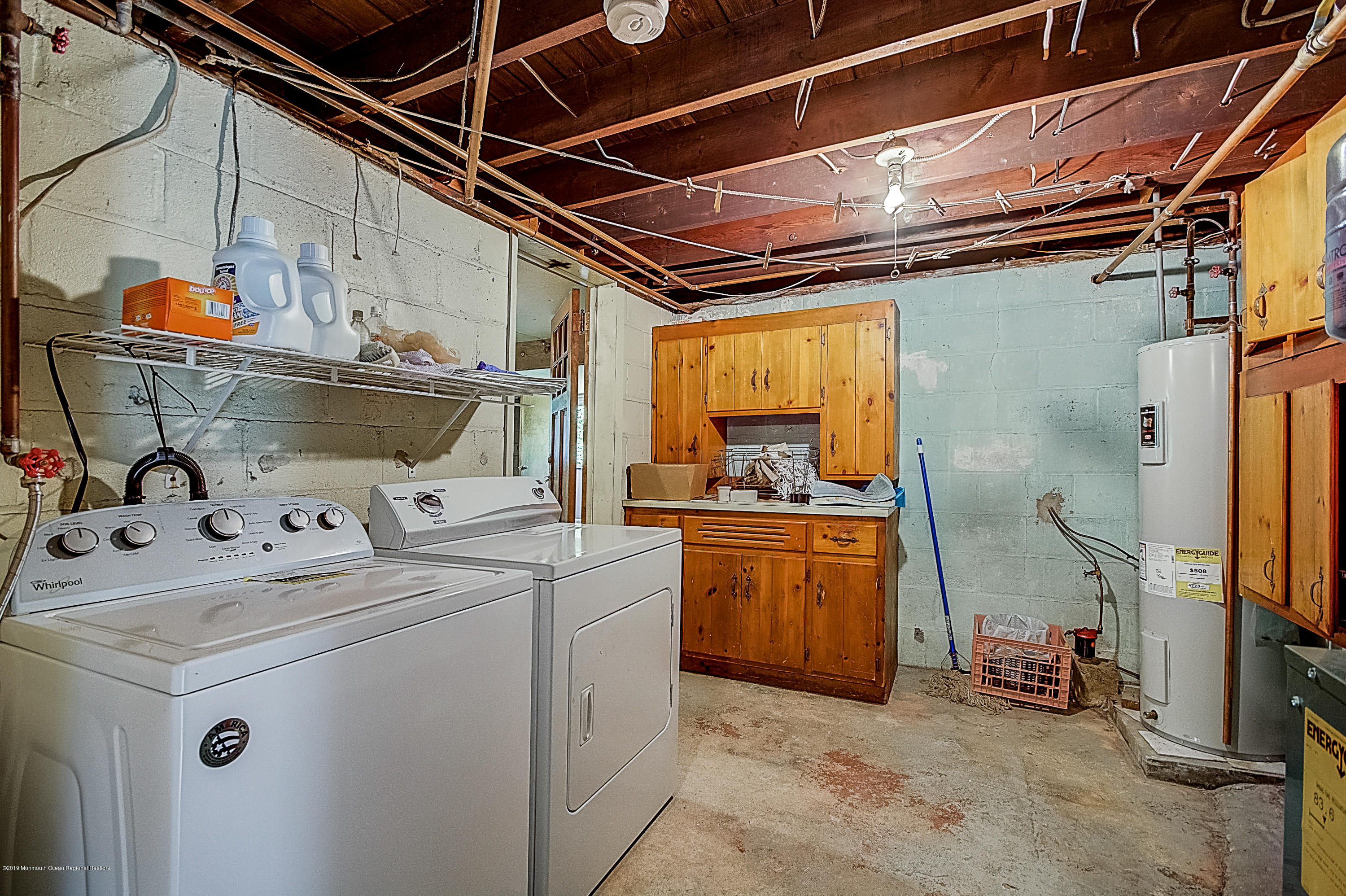 137 Pond Road Freehold, NJ 07728 - Photo 43 of 52 a utility room with dryer and washer
