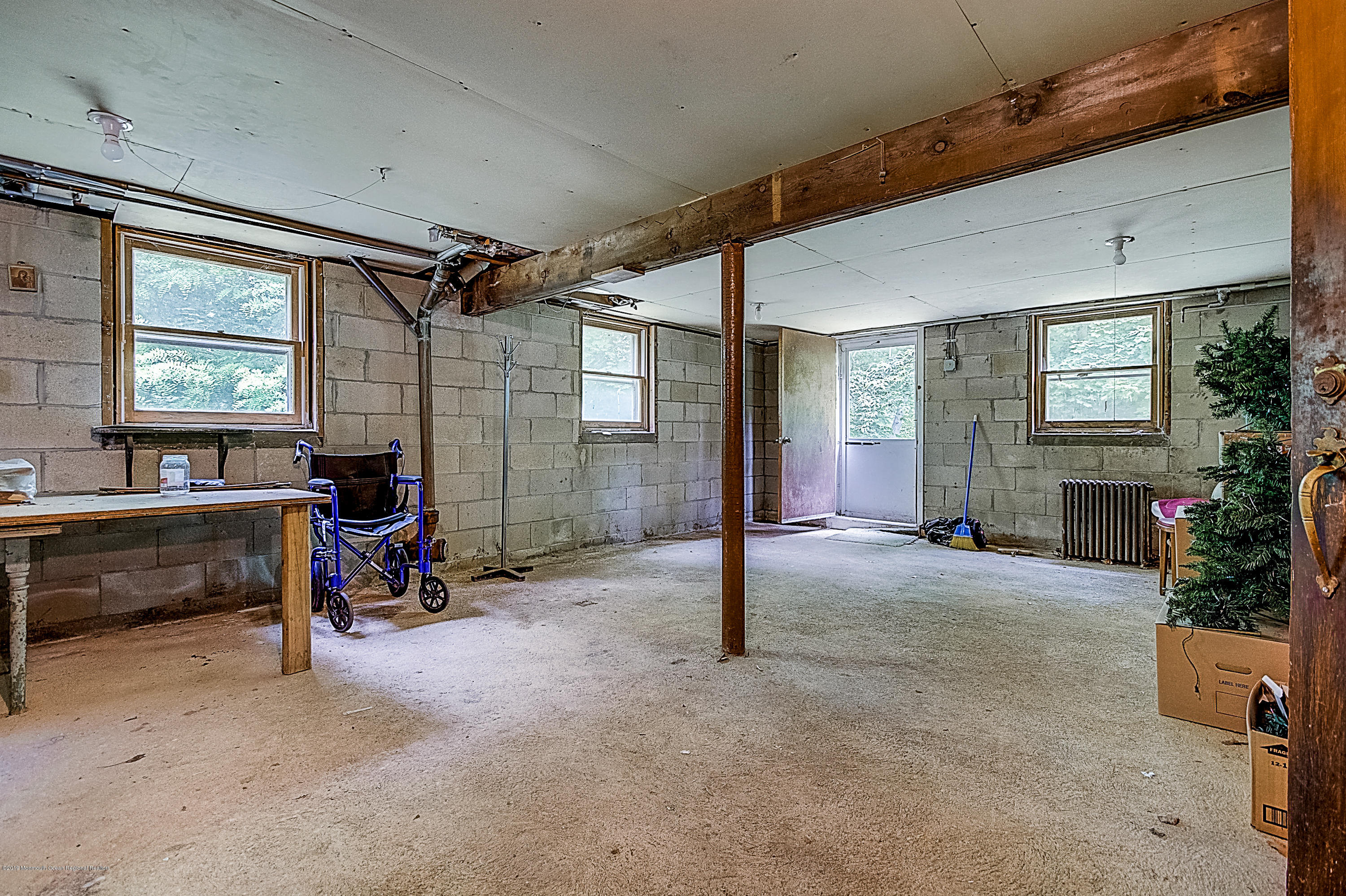 137 Pond Road Freehold, NJ 07728 - Photo 47 of 52 a view of a livingroom with furniture and a window