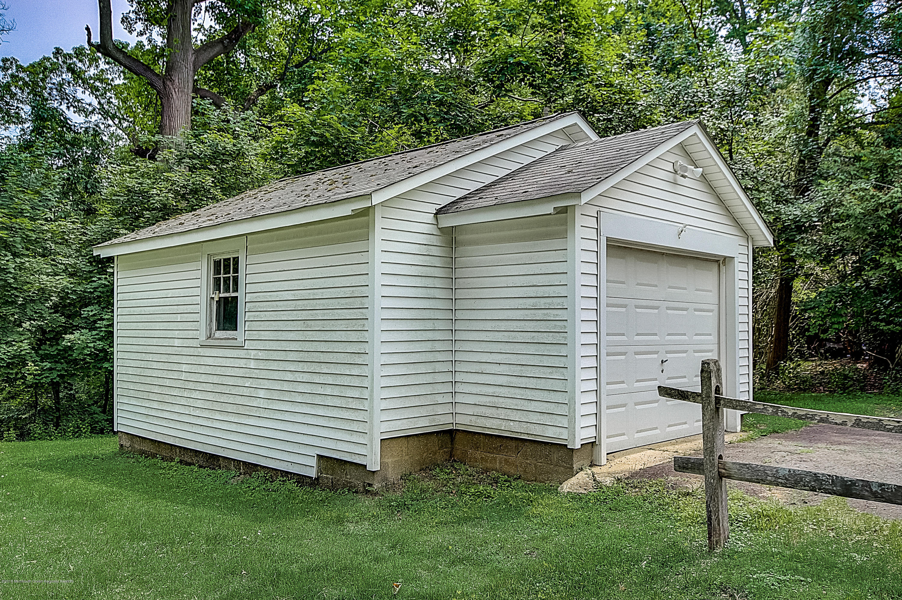 137 Pond Road Freehold, NJ 07728 - Photo 48 of 52 a view of a house with a yard