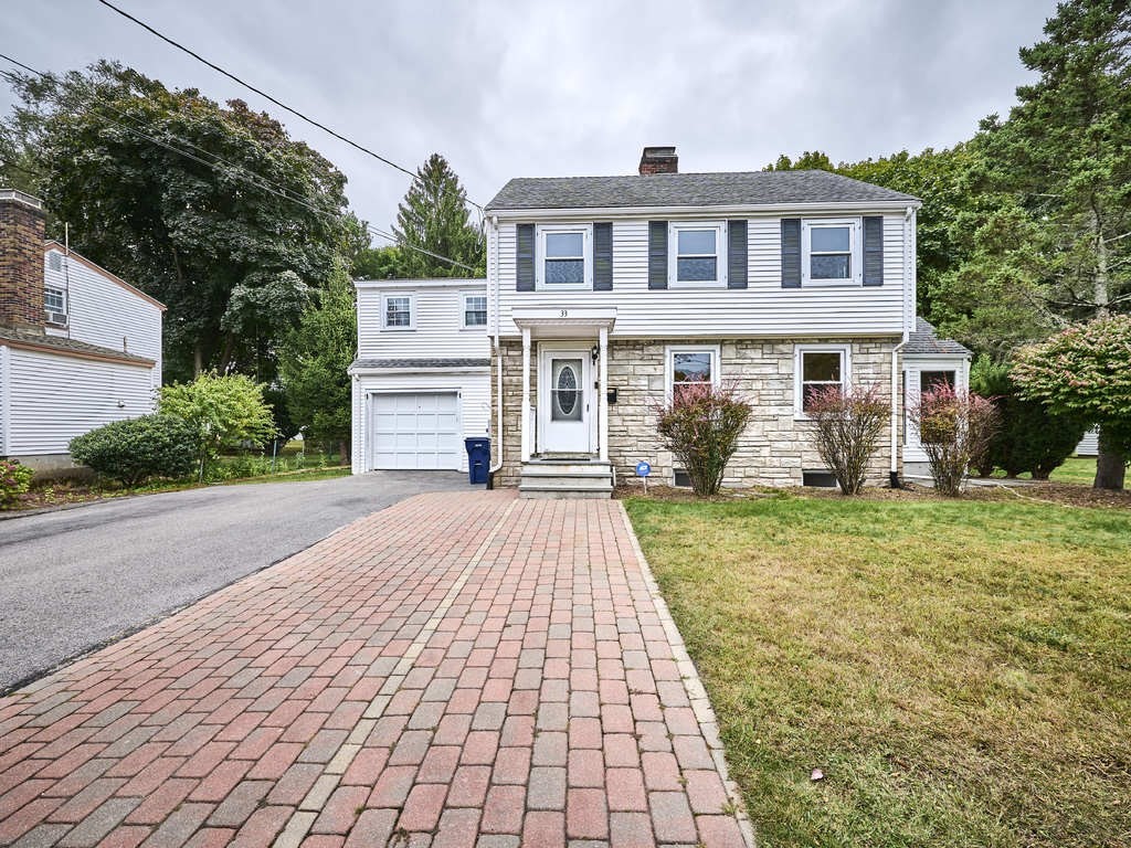 33 Theodore Road Newton, MA 02459 - Photo 1 of 42 a front view of a house with garden