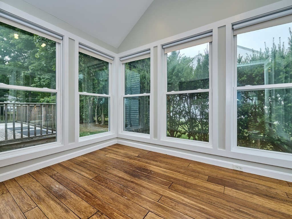 33 Theodore Road Newton, MA 02459 - Photo 7 of 42 a view of a room with wooden floor and windows