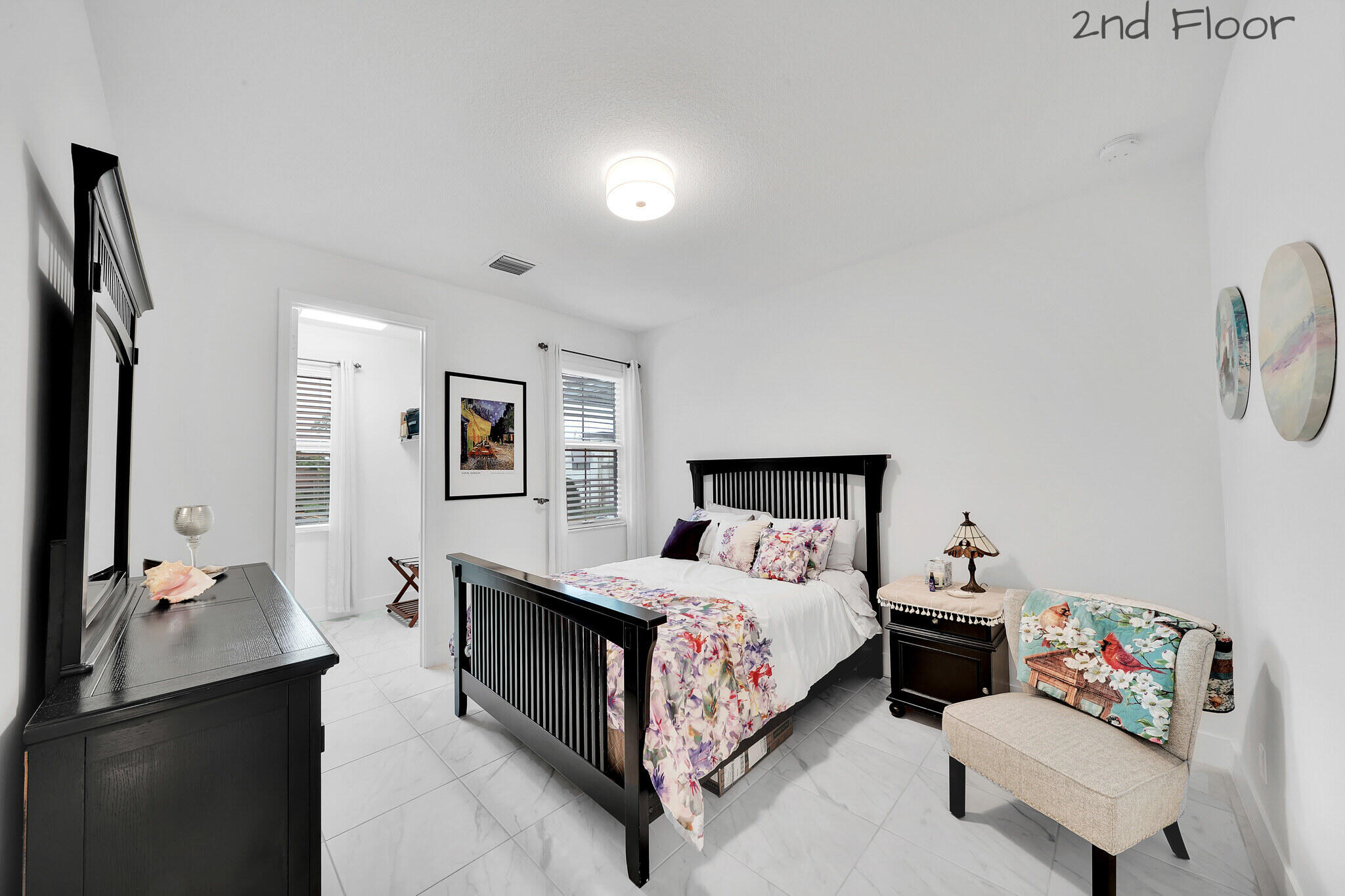 4821 Pointe Midtown Road Palm Beach Gardens, FL 33418 - Photo 24 of 62 a bedroom with a bed and a couch