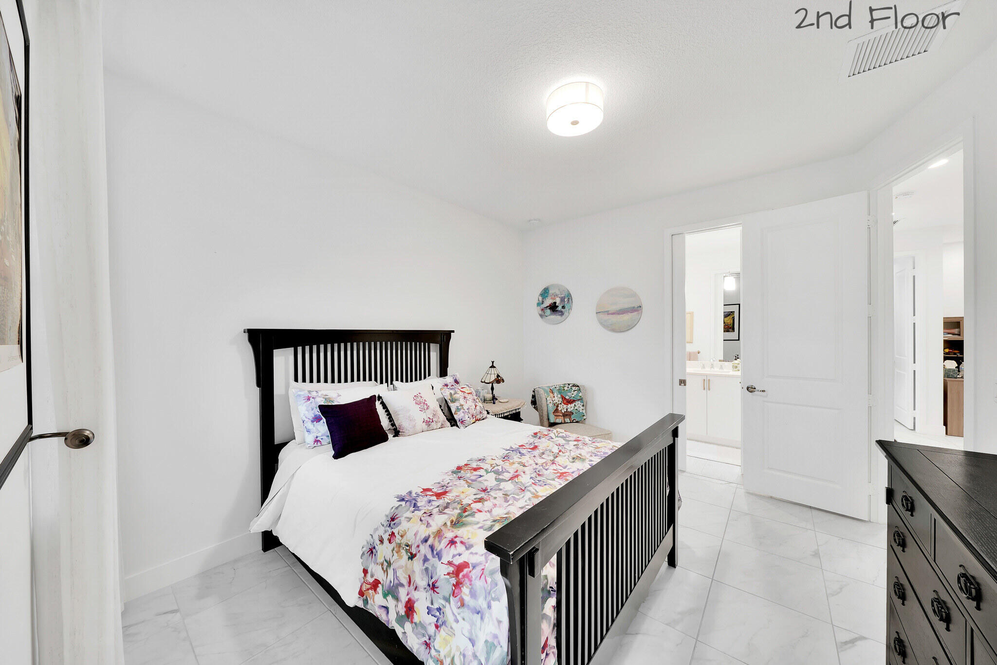 4821 Pointe Midtown Road Palm Beach Gardens, FL 33418 - Photo 26 of 62 a bedroom with double bed and a window