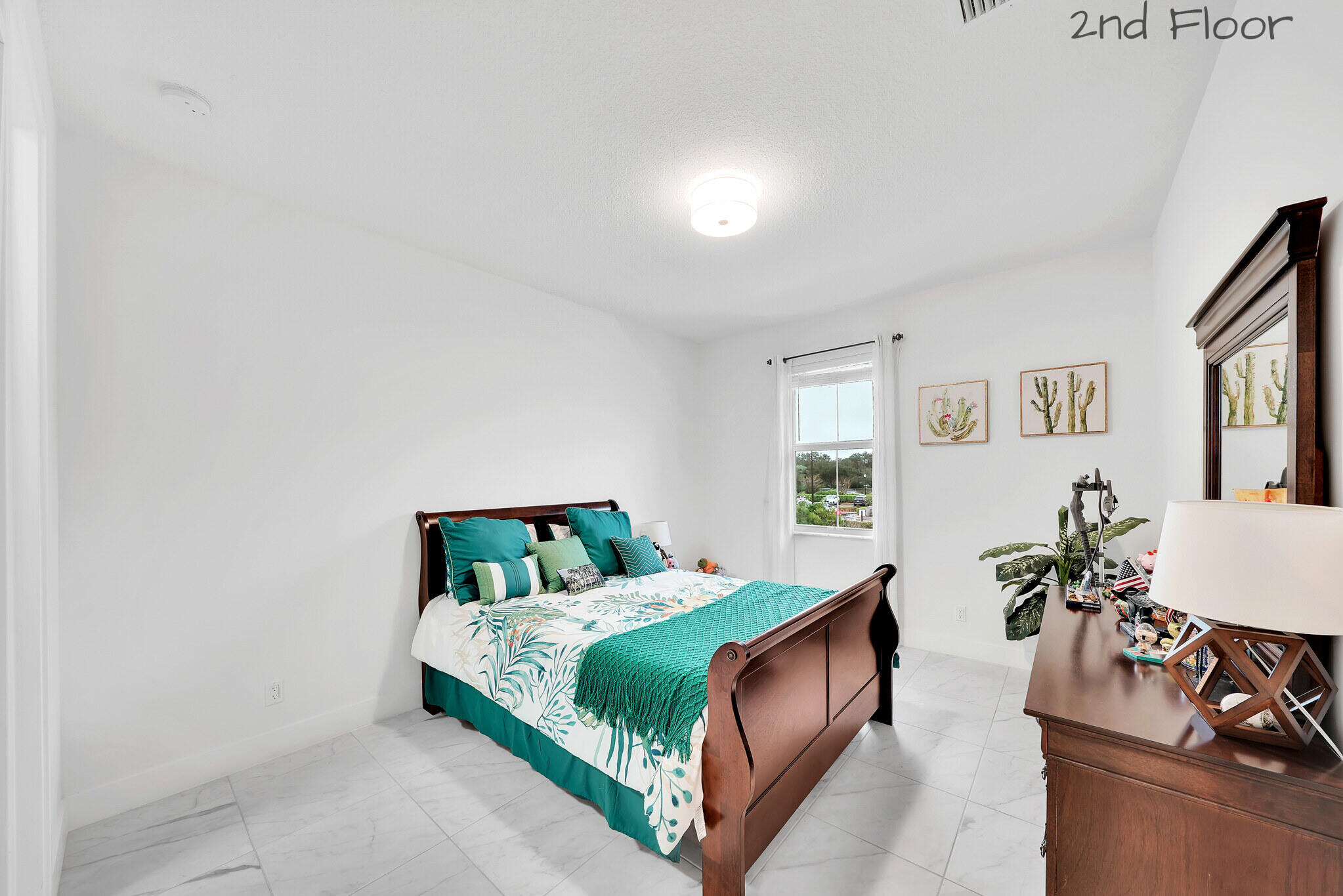 4821 Pointe Midtown Road Palm Beach Gardens, FL 33418 - Photo 28 of 62 a bedroom with a bed window and couch