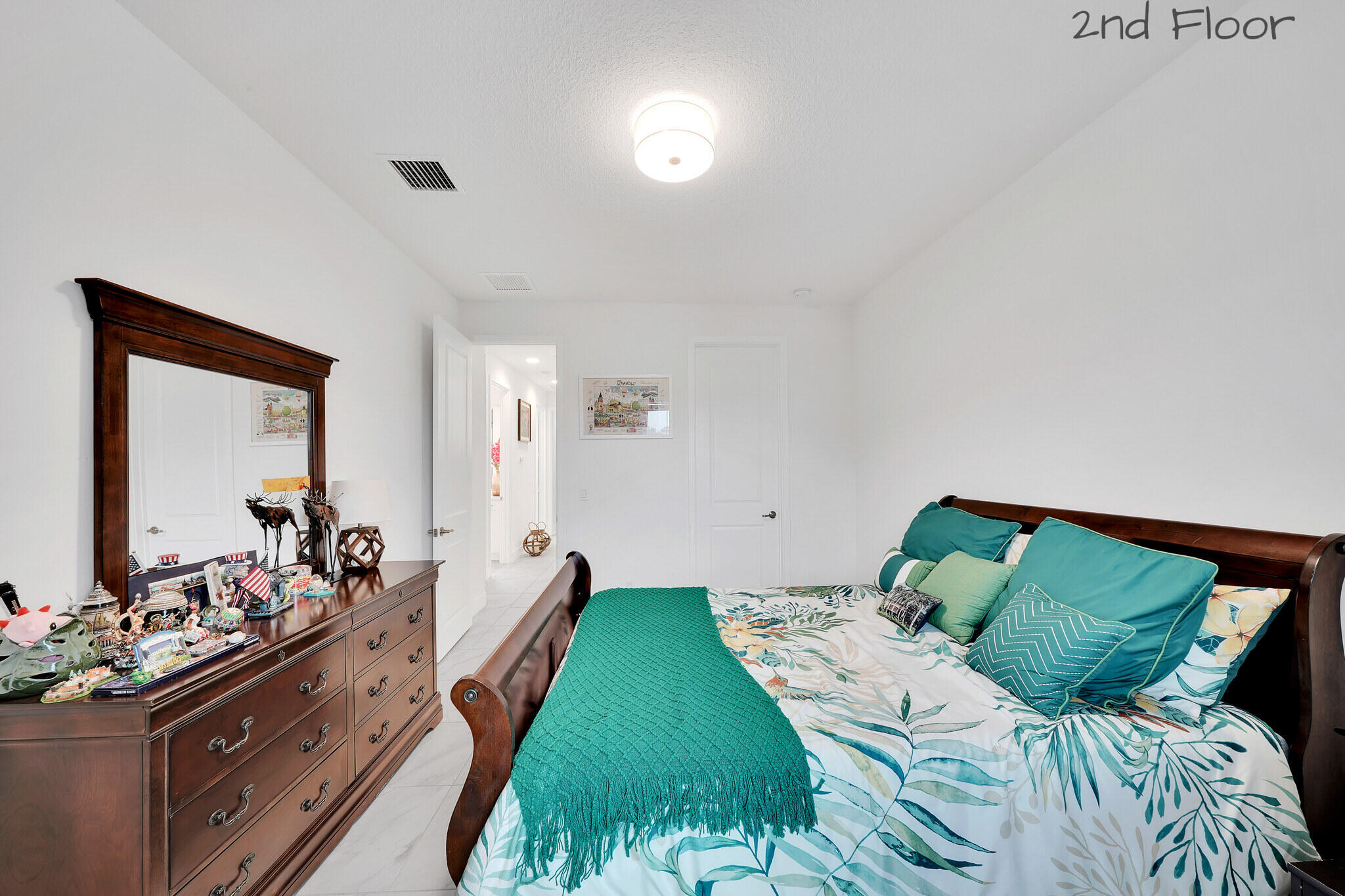 4821 Pointe Midtown Road Palm Beach Gardens, FL 33418 - Photo 29 of 62 a bedroom with a bed and a mirror