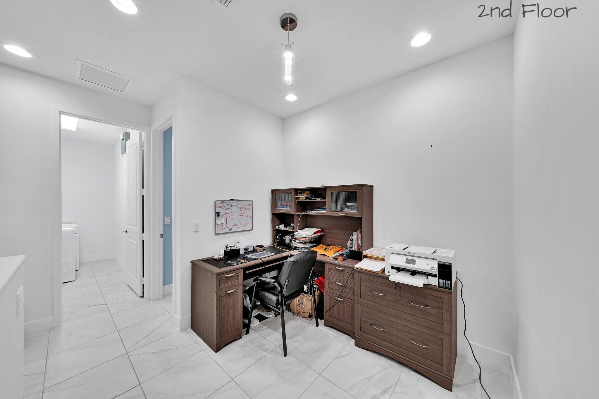4821 Pointe Midtown Road Palm Beach Gardens, FL 33418 - Photo 32 of 62 a kitchen with a sink and a stove top oven