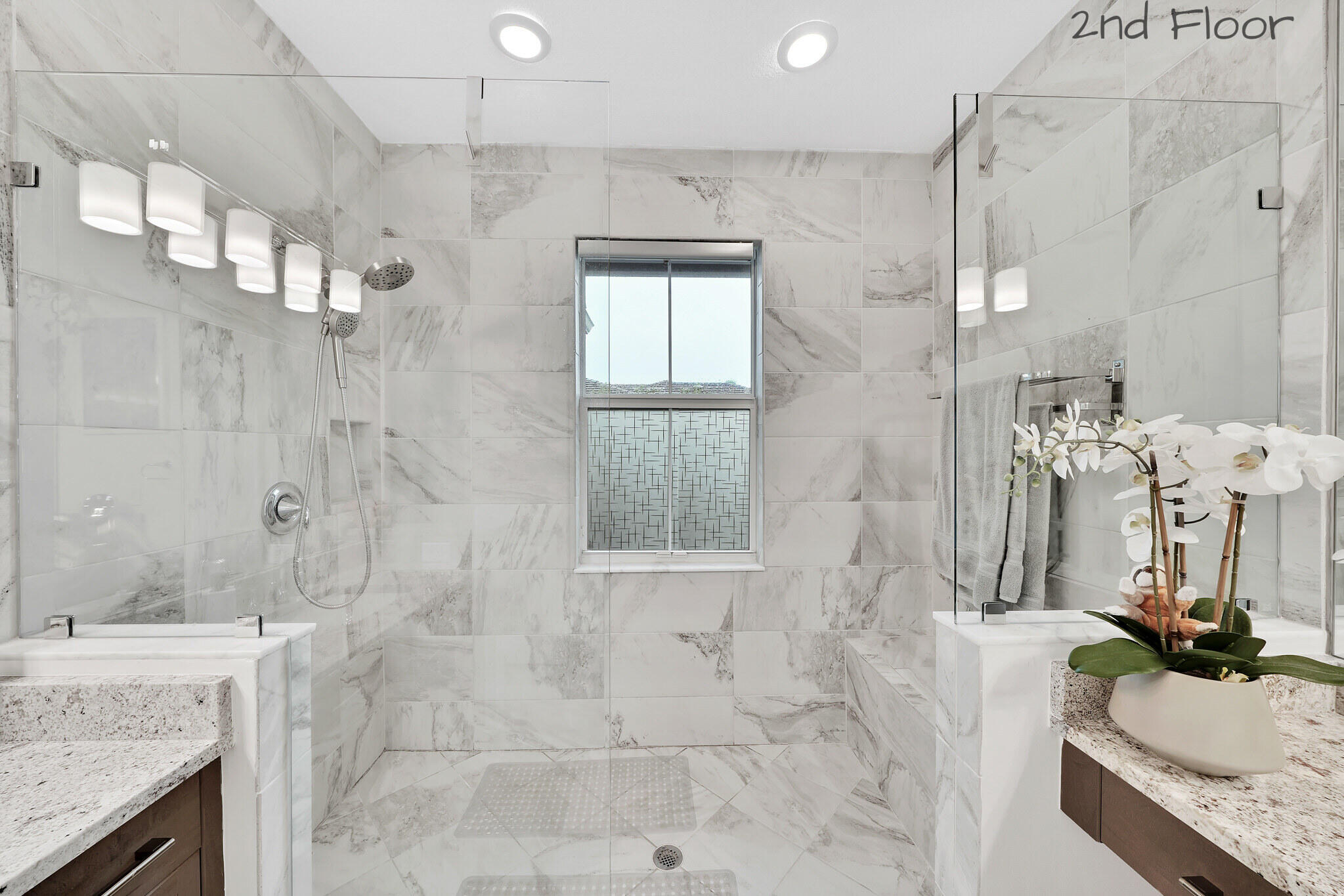 4821 Pointe Midtown Road Palm Beach Gardens, FL 33418 - Photo 40 of 62 a bathroom with a granite countertop sink a toilet and shower