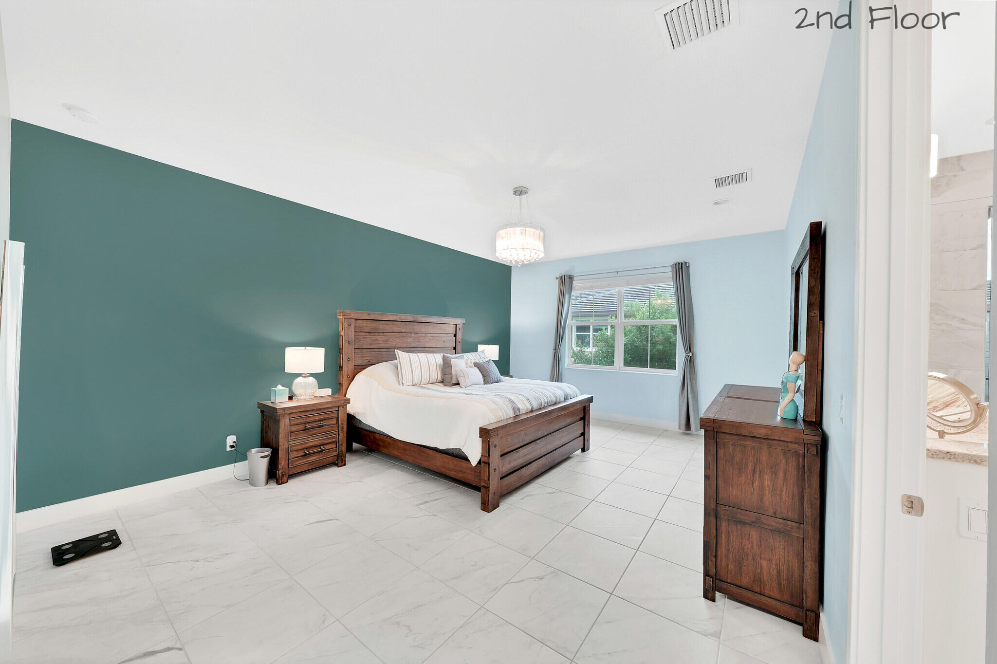 4821 Pointe Midtown Road Palm Beach Gardens, FL 33418 - Photo 4 of 62 a bedroom with a bed and large window