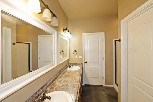 a view of a bathroom from the hallway