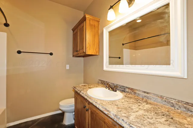 a bathroom with a shower and a shower