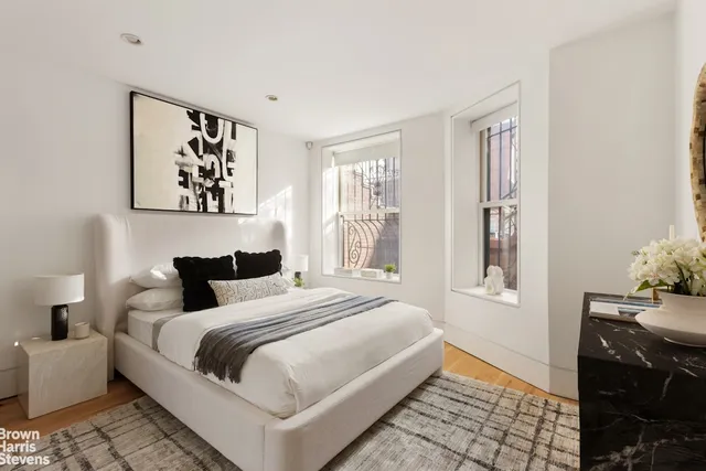 a view of a livingroom with furniture and window