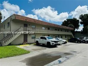 a car parked in front of a house
