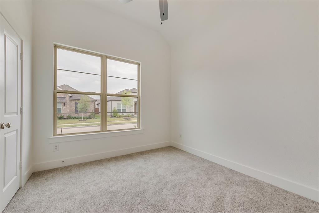 528 Embargo Drive Fate, TX 75189 - Photo 18 of 36 an empty room with a window