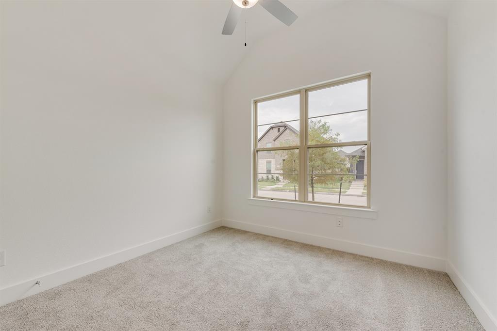 528 Embargo Drive Fate, TX 75189 - Photo 20 of 36 an empty room with a window