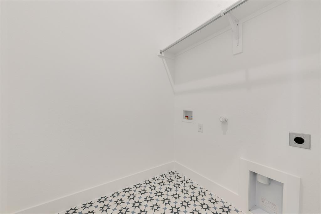 528 Embargo Drive Fate, TX 75189 - Photo 22 of 36 a bathroom with a sink and a shower