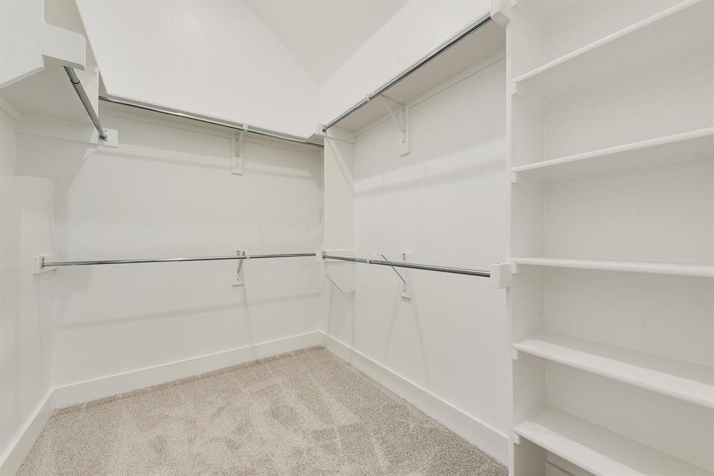 528 Embargo Drive Fate, TX 75189 - Photo 28 of 36 a view of an empty walk in closet