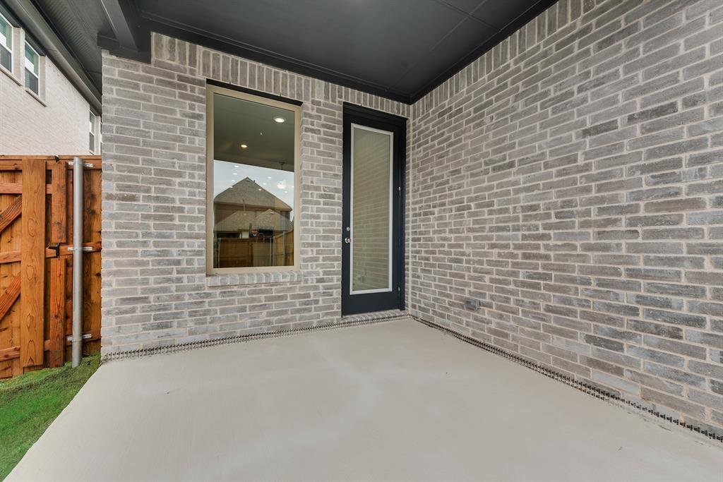 528 Embargo Drive Fate, TX 75189 - Photo 29 of 36 a view of an empty room and fire place
