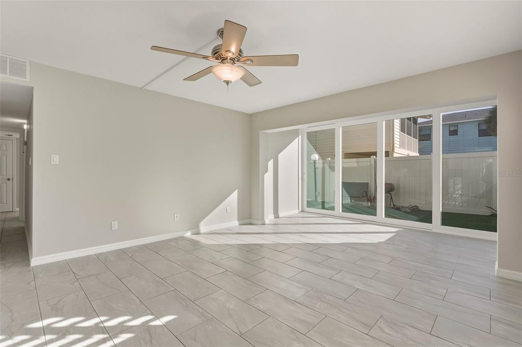 5055 North Beach Road, Unit 108 Englewood, FL 34223 - Photo 11 of 36 a view of an empty room with a window