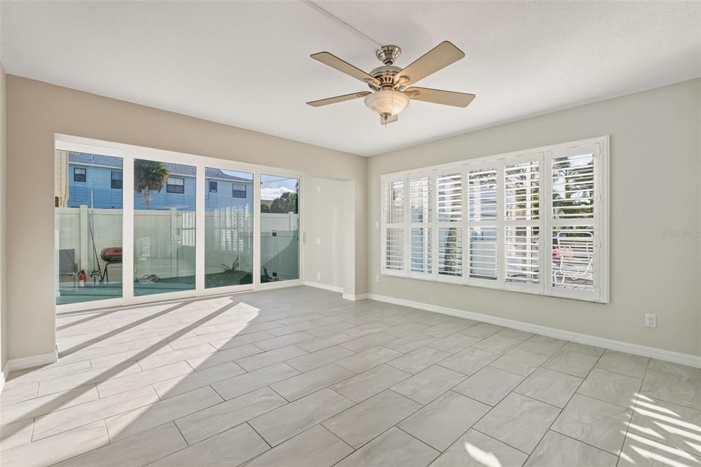 5055 North Beach Road, Unit 108 Englewood, FL 34223 - Photo 16 of 36 a view of an empty room with a window
