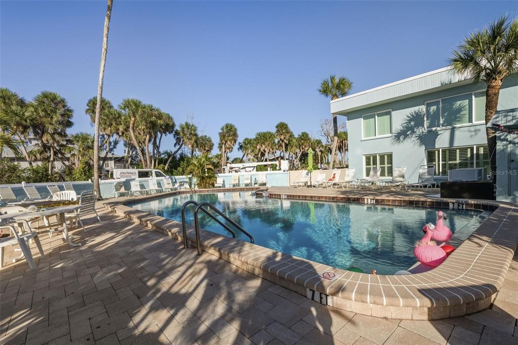 5055 North Beach Road, Unit 108 Englewood, FL 34223 - Photo 30 of 36 a view of a swimming pool with a patio