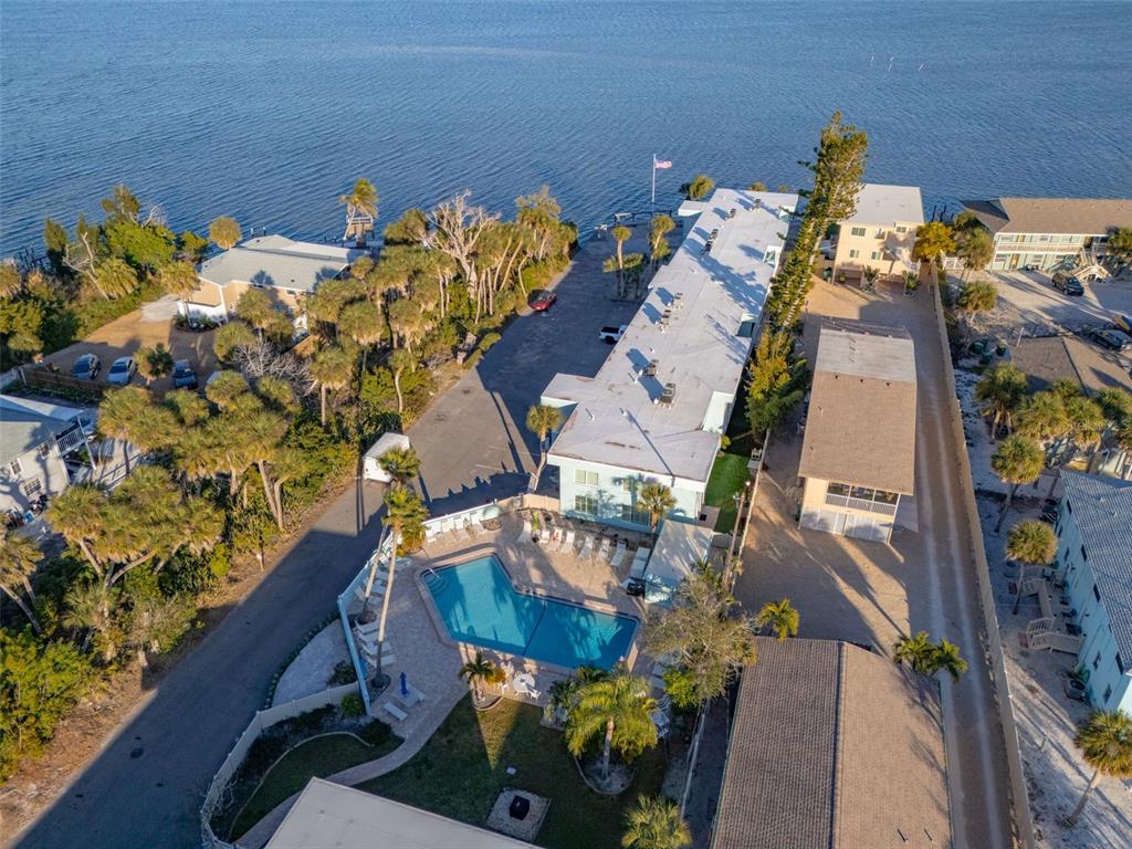 5055 North Beach Road, Unit 108 Englewood, FL 34223 - Photo 31 of 36 an aerial view of residential houses with outdoor space