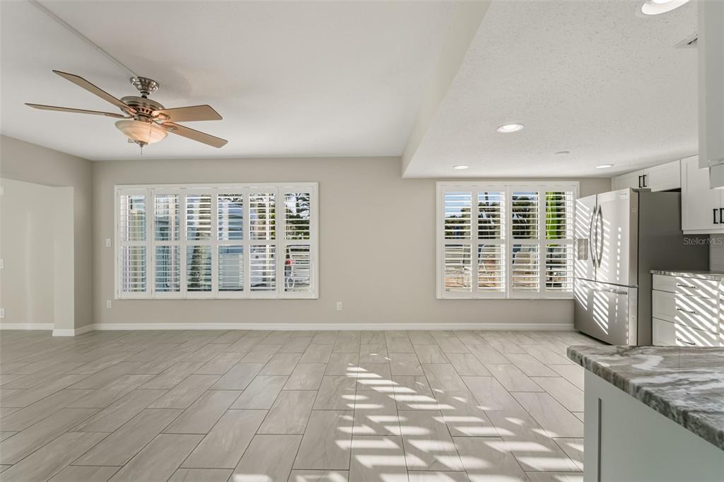 5055 North Beach Road, Unit 108 Englewood, FL 34223 - Photo 4 of 36 a view of an empty room with a window