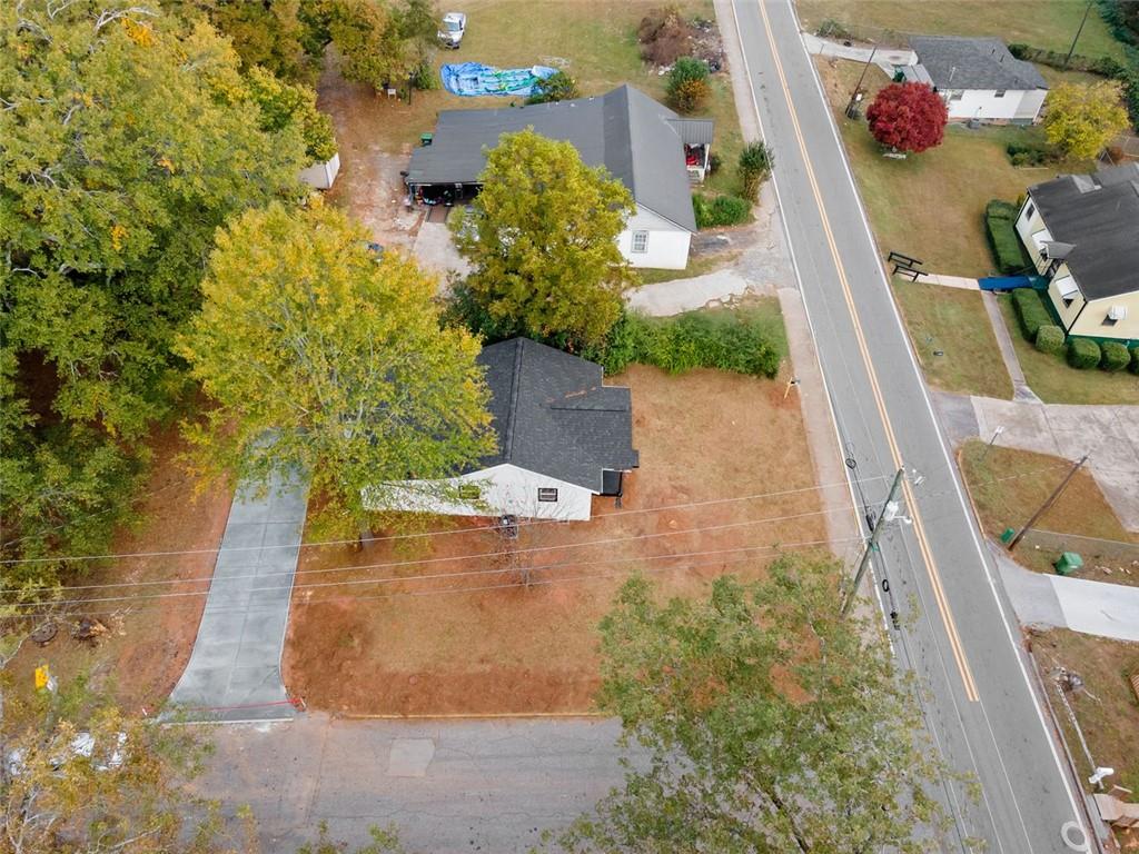 118 Perry Street Monroe, GA 30655 - Photo 29 of 30 an aerial view of a house with swimming pool